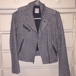 Grey and black jacket with zippers